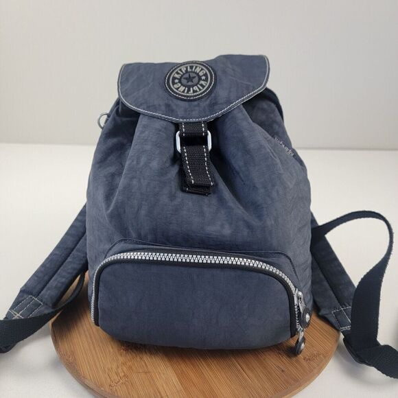 Kipling Drawstring Top Flap Backpack Blue Navy Lined Rucksack Hiking Outdoor Bag - Picture 1 of 14